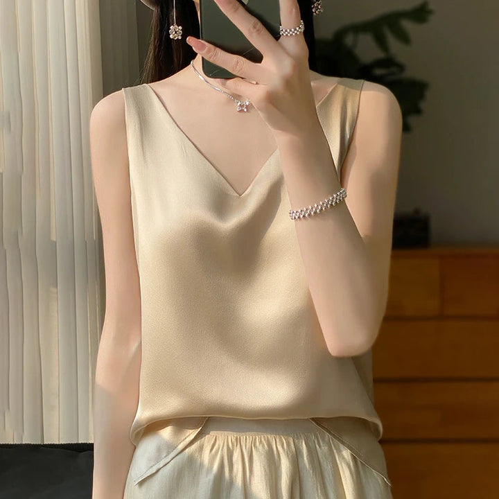 Top de tejido satinado para mujer, detalle del acabado