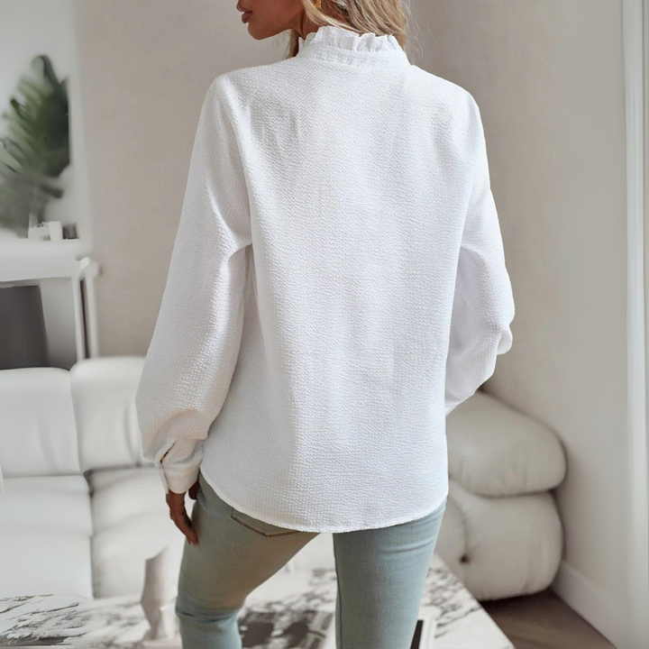 Elegante blusa de manga larga