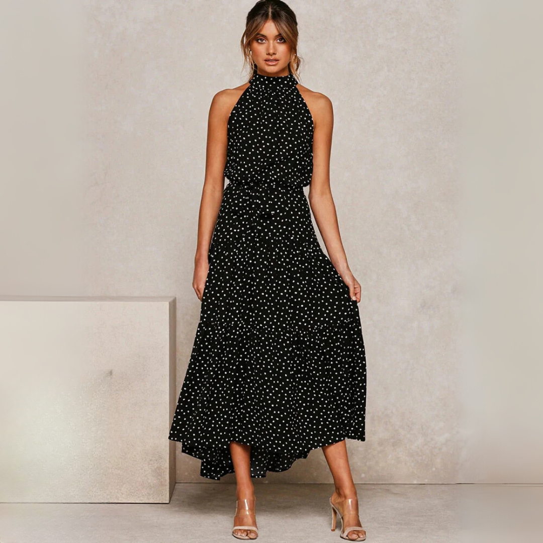 Vestido midi ajustado y acampanado con lunares, vista de cerca