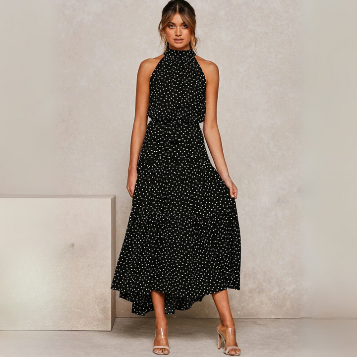 Vestido midi ajustado y acampanado con lunares, vista de cerca