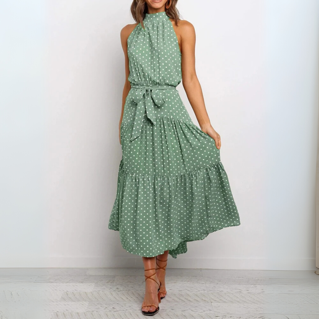 Vestido midi ajustado y acampanado con lunares, vista posterior