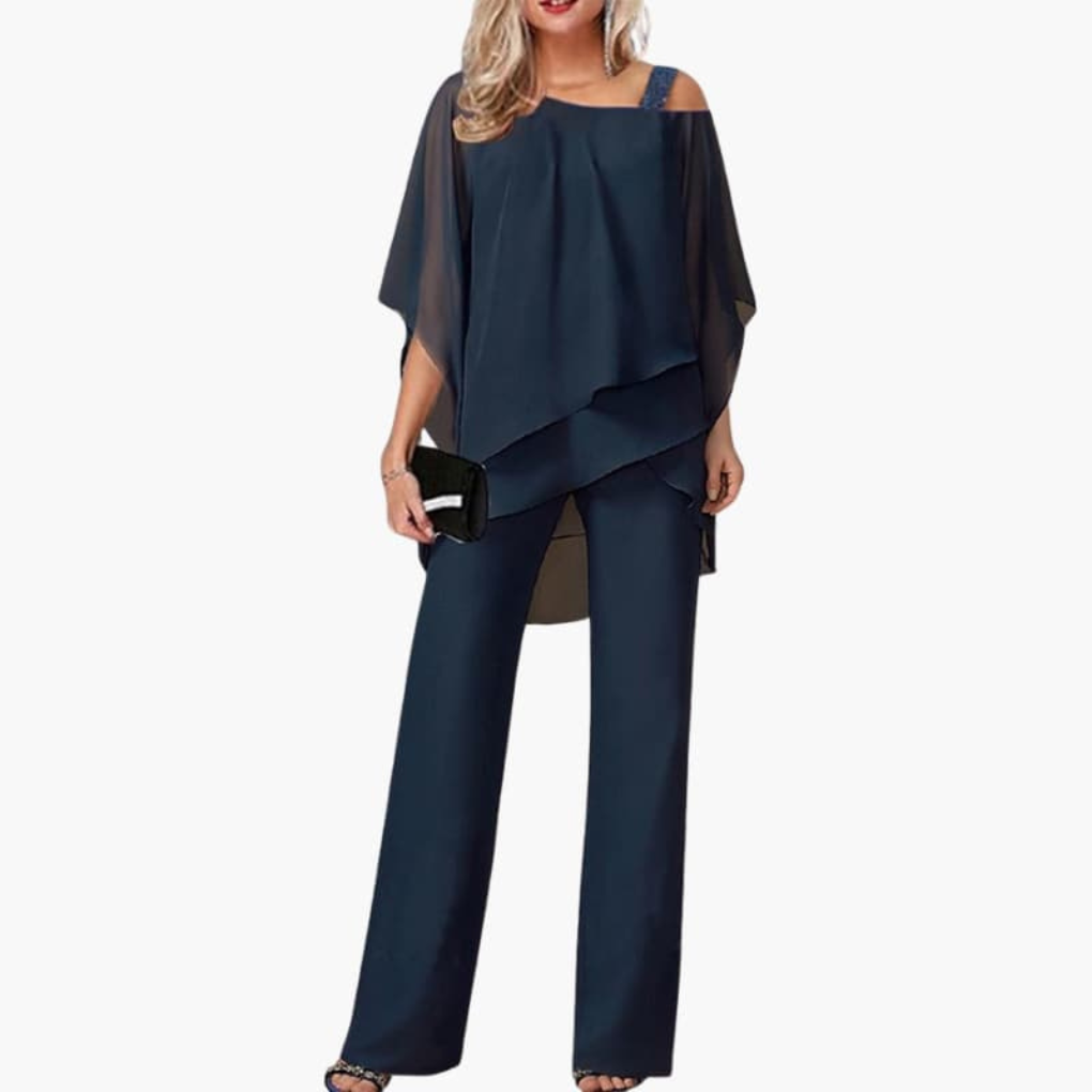 Mono de mujer con hombros descubiertos y pantalones anchos