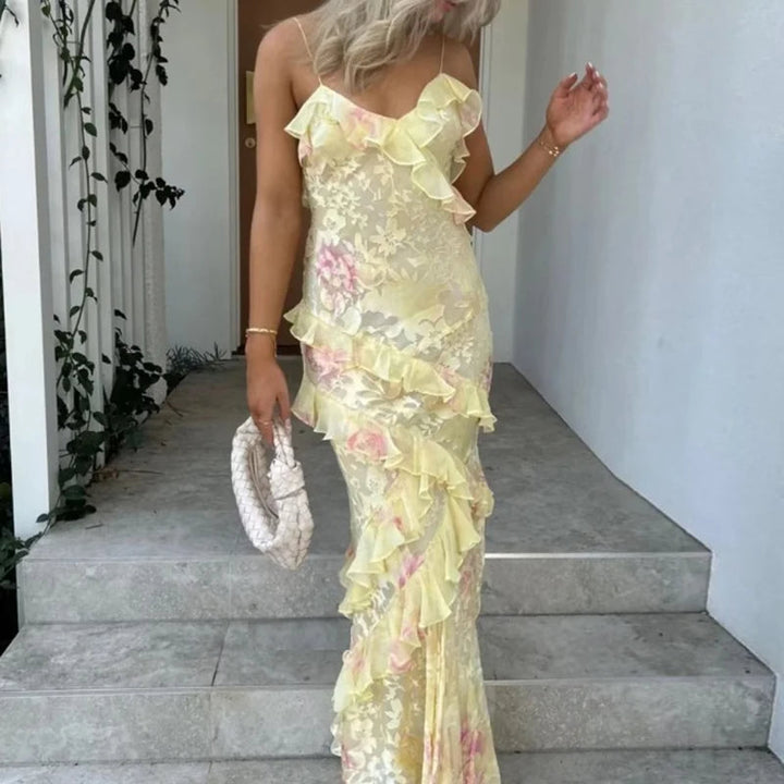Vestido largo bohemio con volantes y escote en V, detalle del tejido