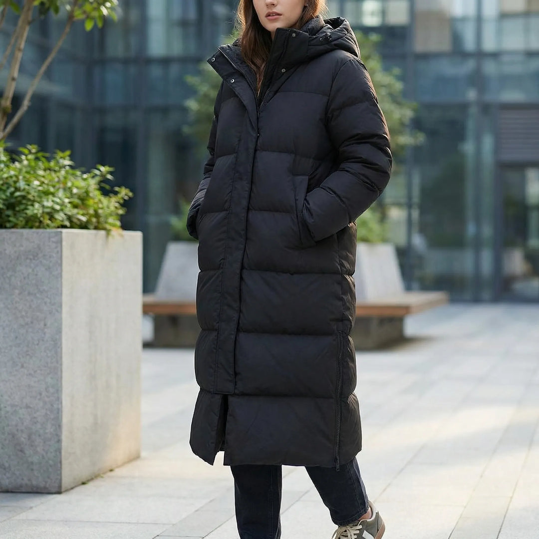 Arcova - Parka acolchada larga con capucha para mujer