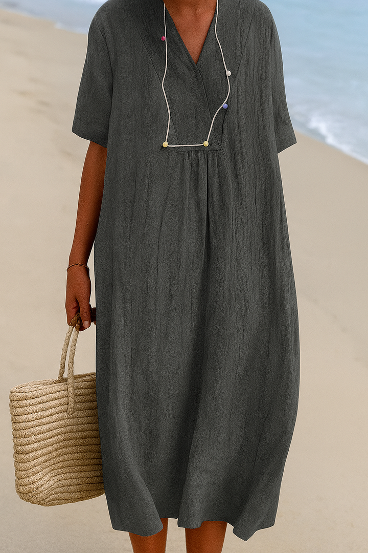 Vestido de playa holgado con cuello en V y mangas cortas
