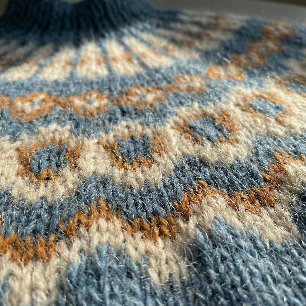 Fjelora - Jersey de punto con estampado nórdico Fair Isle