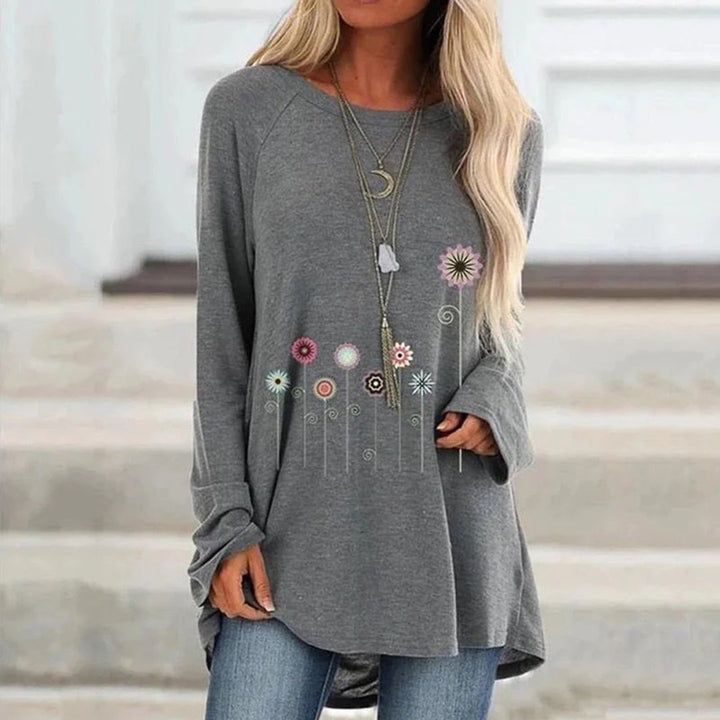 Sudadera con bordado floral en 3D: textura suave y elegancia sutil