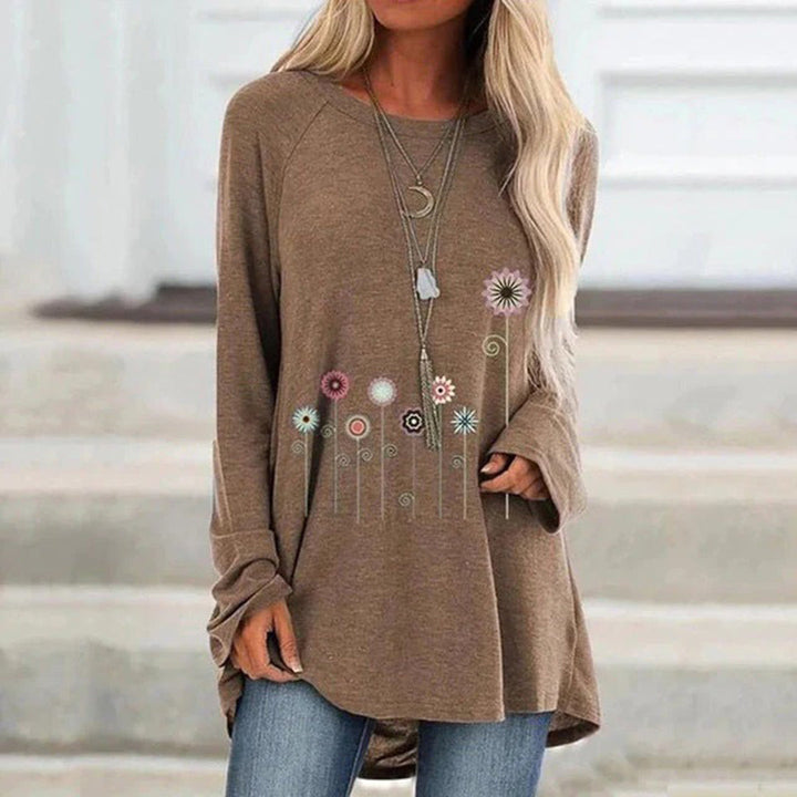 Sudadera con bordado floral en 3D: textura suave y elegancia sutil