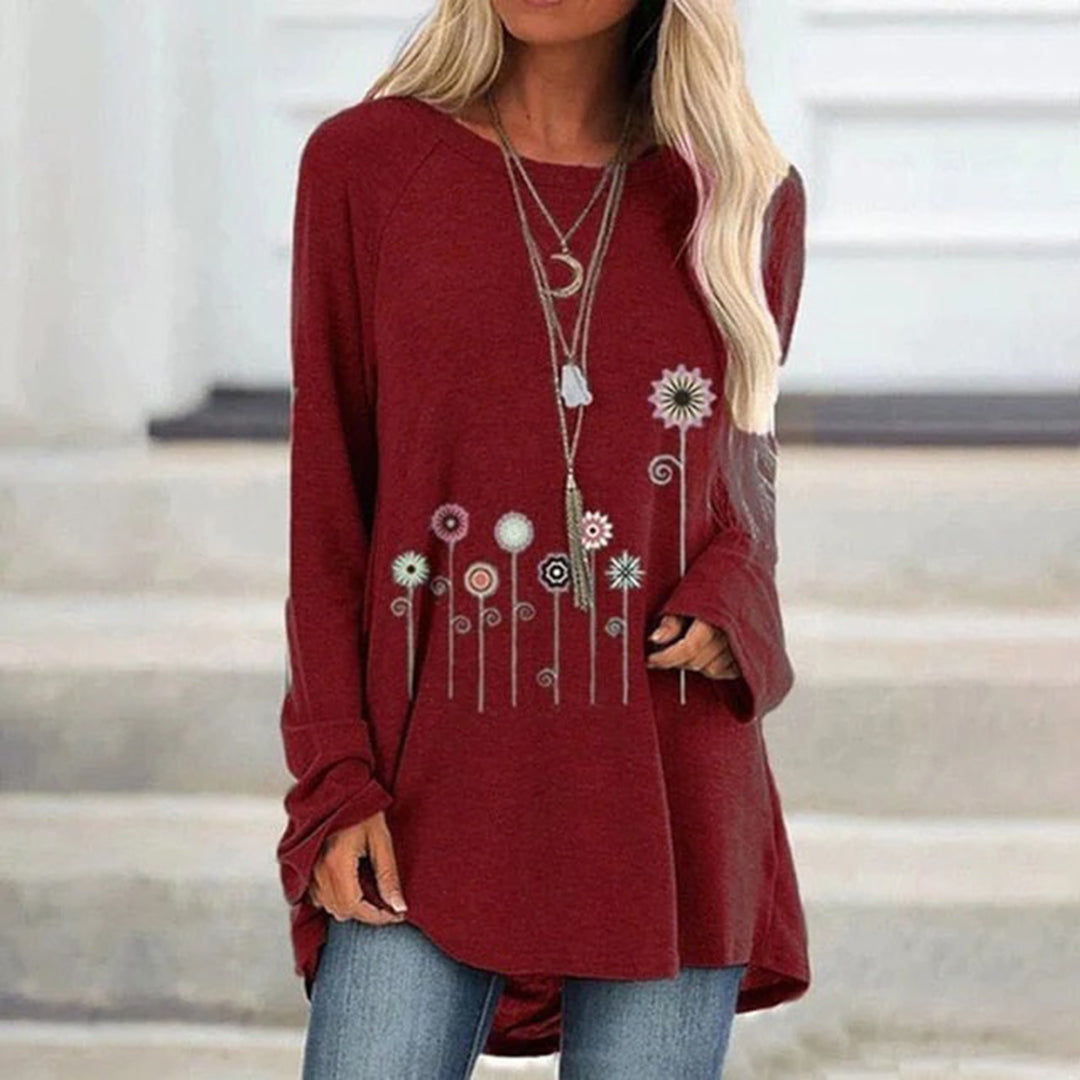 Sudadera con bordado floral en 3D: textura suave y elegancia sutil