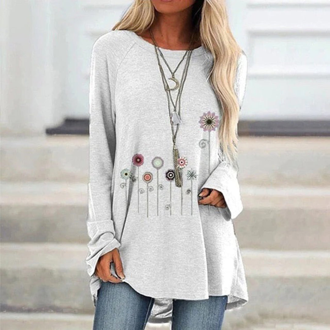 Sudadera con bordado floral en 3D: textura suave y elegancia sutil