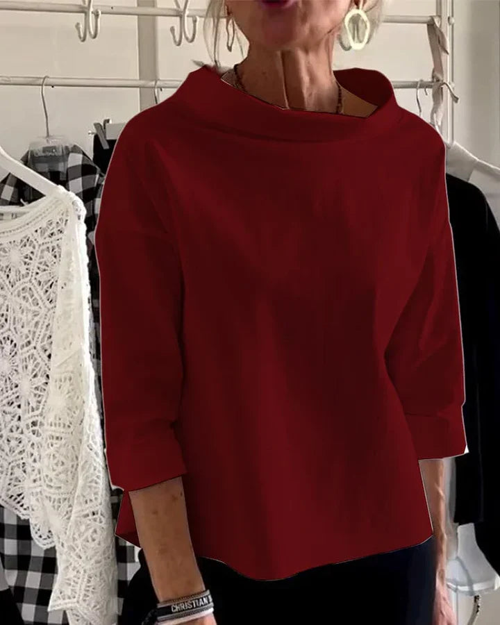 Top informal con solapas anchas y cuello de tortuga a media altura para un look elegante