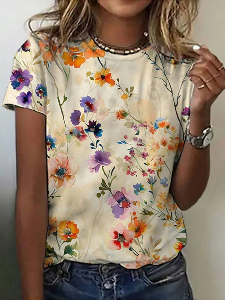 Camiseta vintage de mujer con estampado floral y cuello redondo