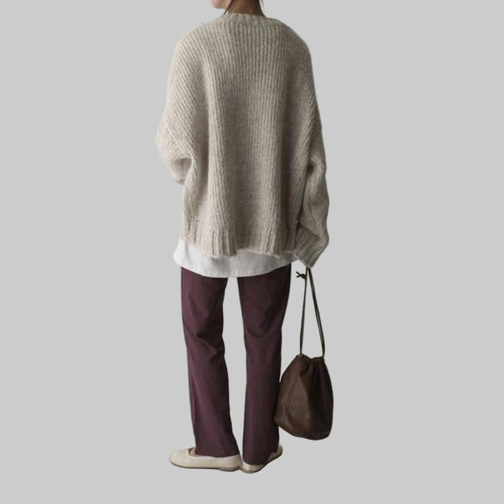 Suéter Oversized Ivory con Frente de Bolsillo – Capa Relajada para el Día a Día