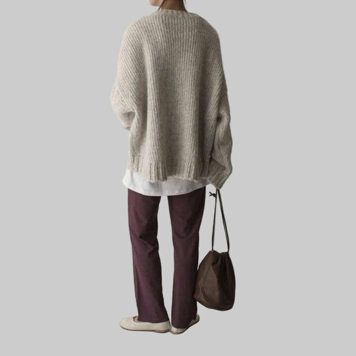 Suéter Oversized Ivory con Frente de Bolsillo – Capa Relajada para el Día a Día